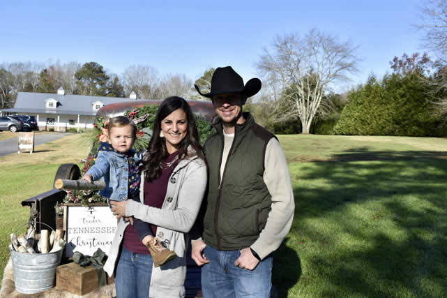 Amanda with her husband and child