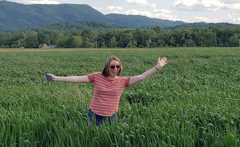 Katie Mason standing in a field