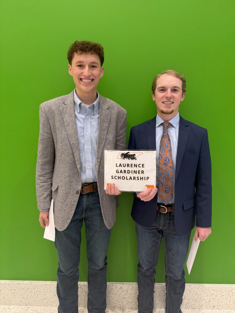 Two students standing togther